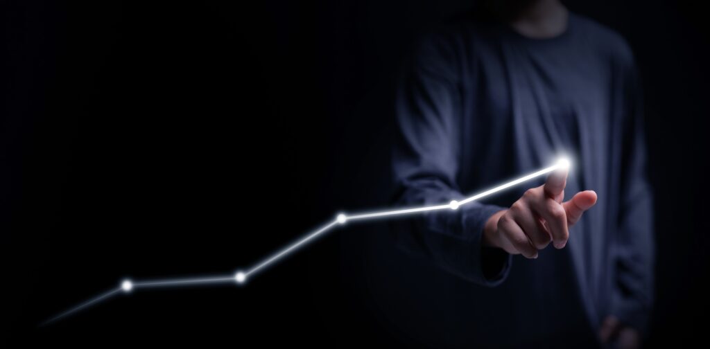 Business growth concept with a glowing rising line chart