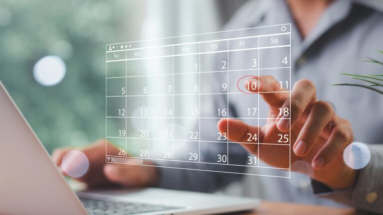 Businessman manages time for effective work