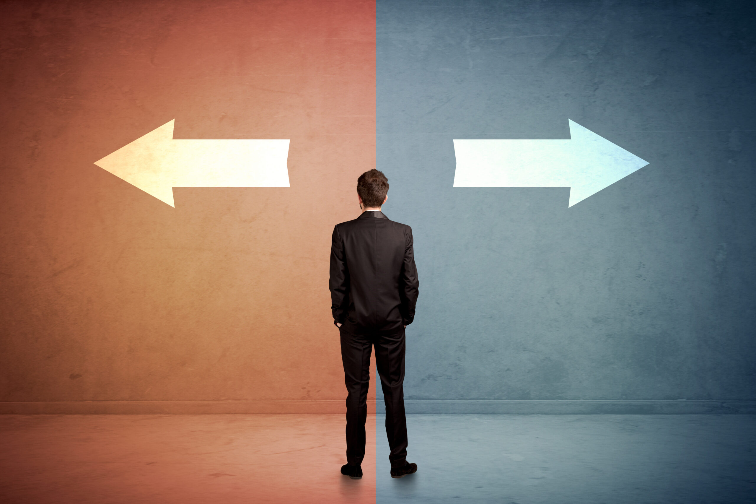 Man standing, deciding which direction to go