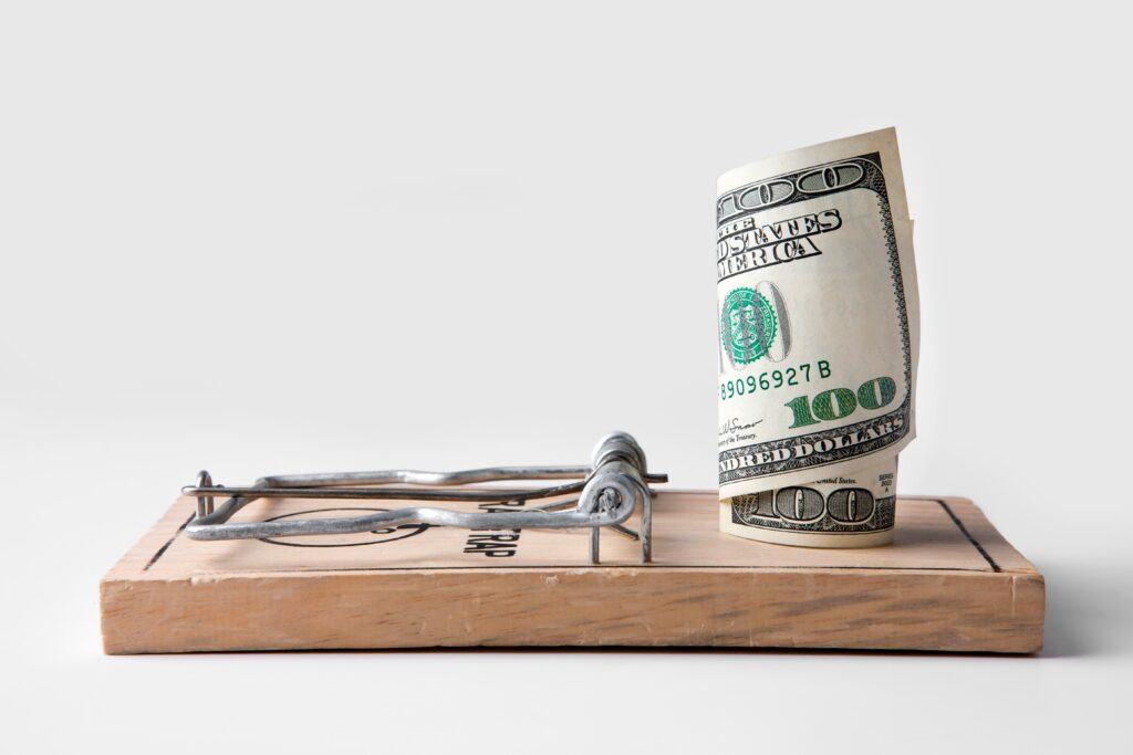 Money placed on a mouse trap