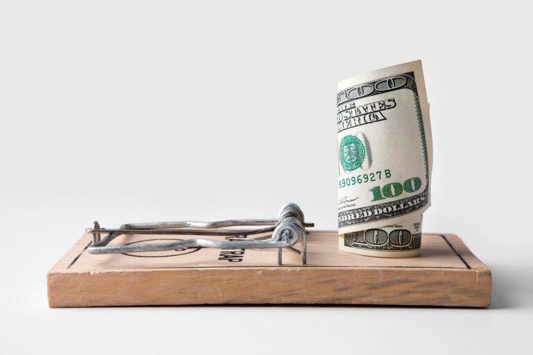 Money placed on a mouse trap