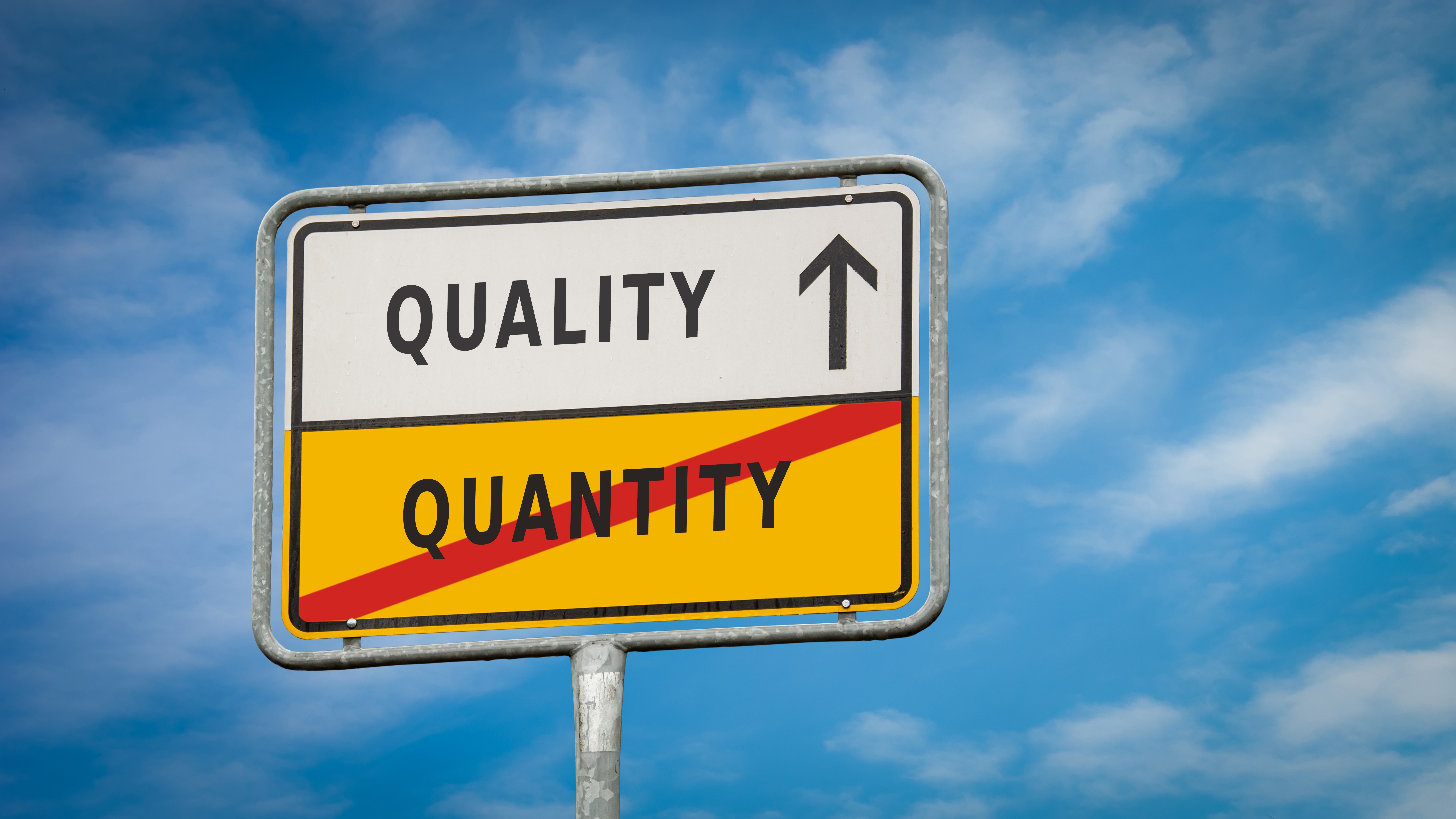 Street Sign the Direction Way to Quality versus Quantity